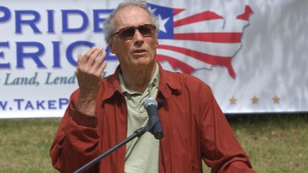 an image of Cint Eastwood having a speech